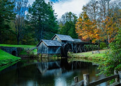 Mabry Mill on the Blue Ridge Parkway reflected in its pond among autumn trees